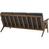 Wooden sofa with dark cushions on a white background