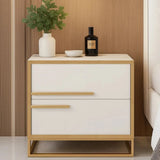 White nightstand with gold accents featuring a plant, bowl, and bottle against a wooden wall.